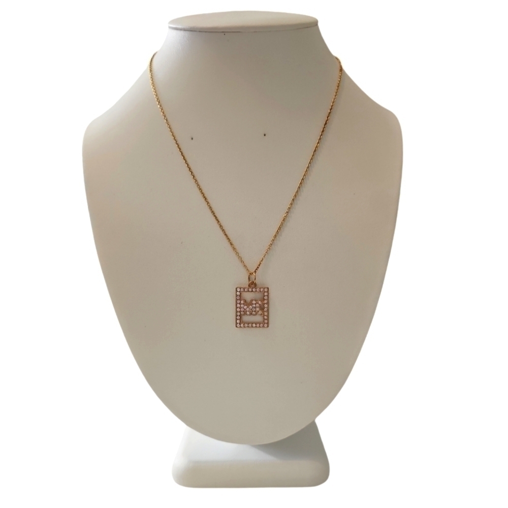 MK rhinestone gold tone necklace